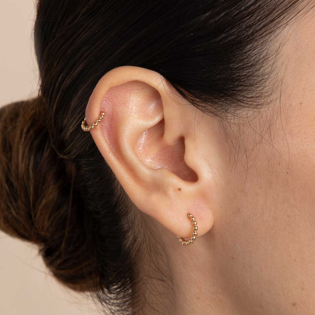 Gold ear store hugging hoops