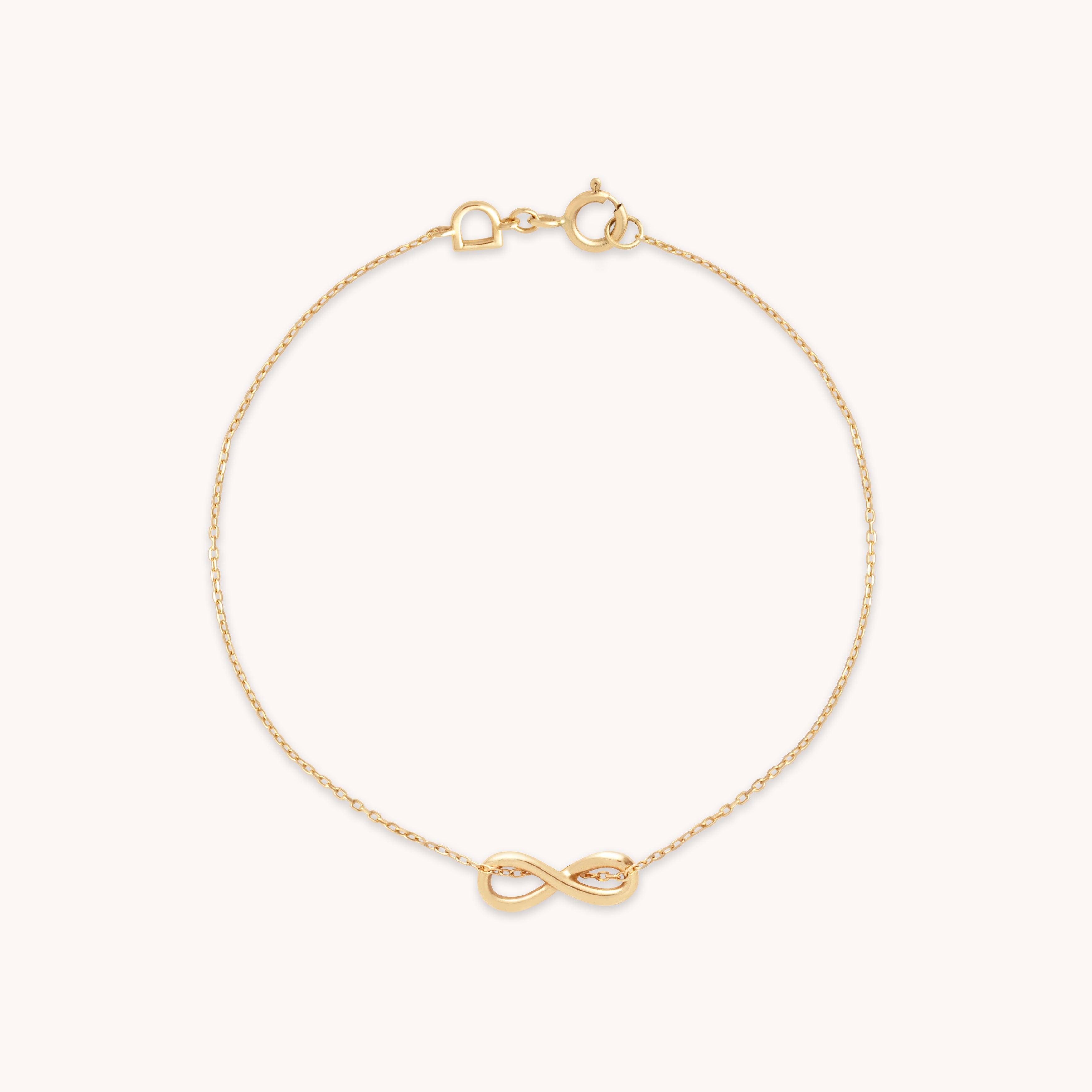 Solid gold charm on sale bracelet