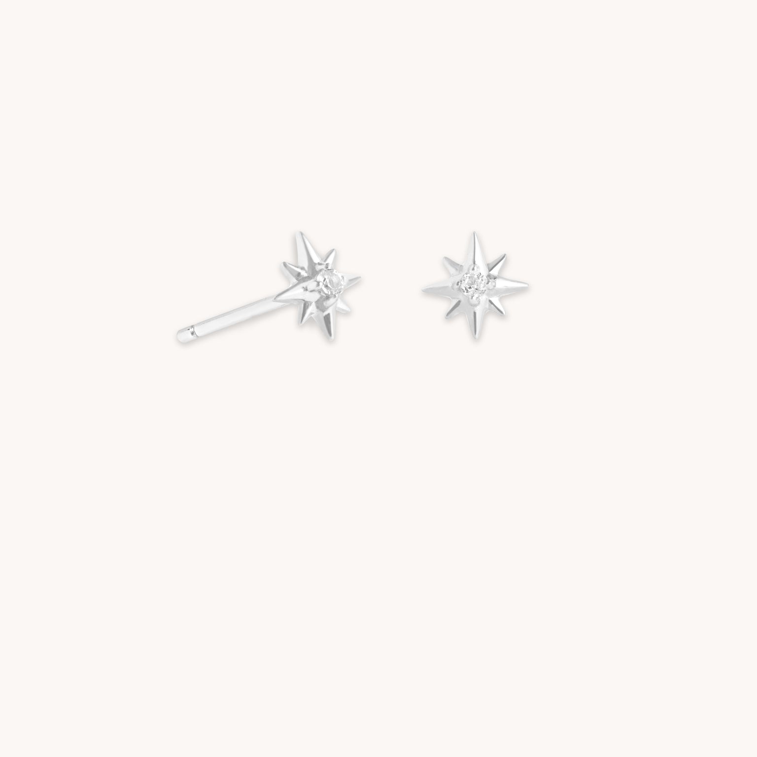 White Topaz Star Studs in Solid White Gold