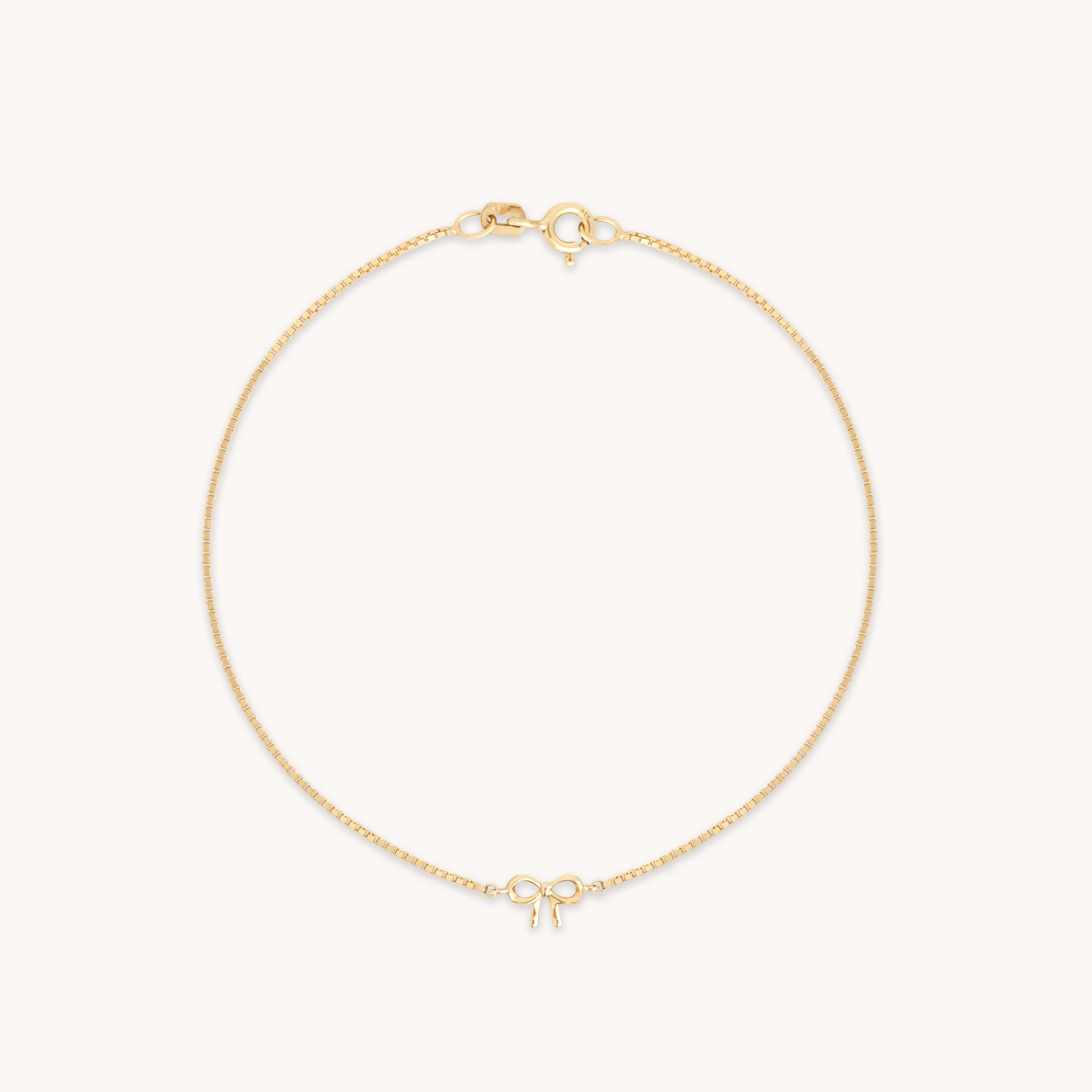 Bow Charm Bracelet in Solid Gold