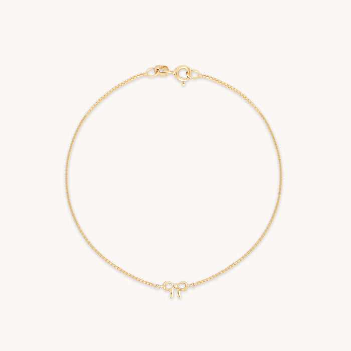 Bow Charm Bracelet in Solid Gold