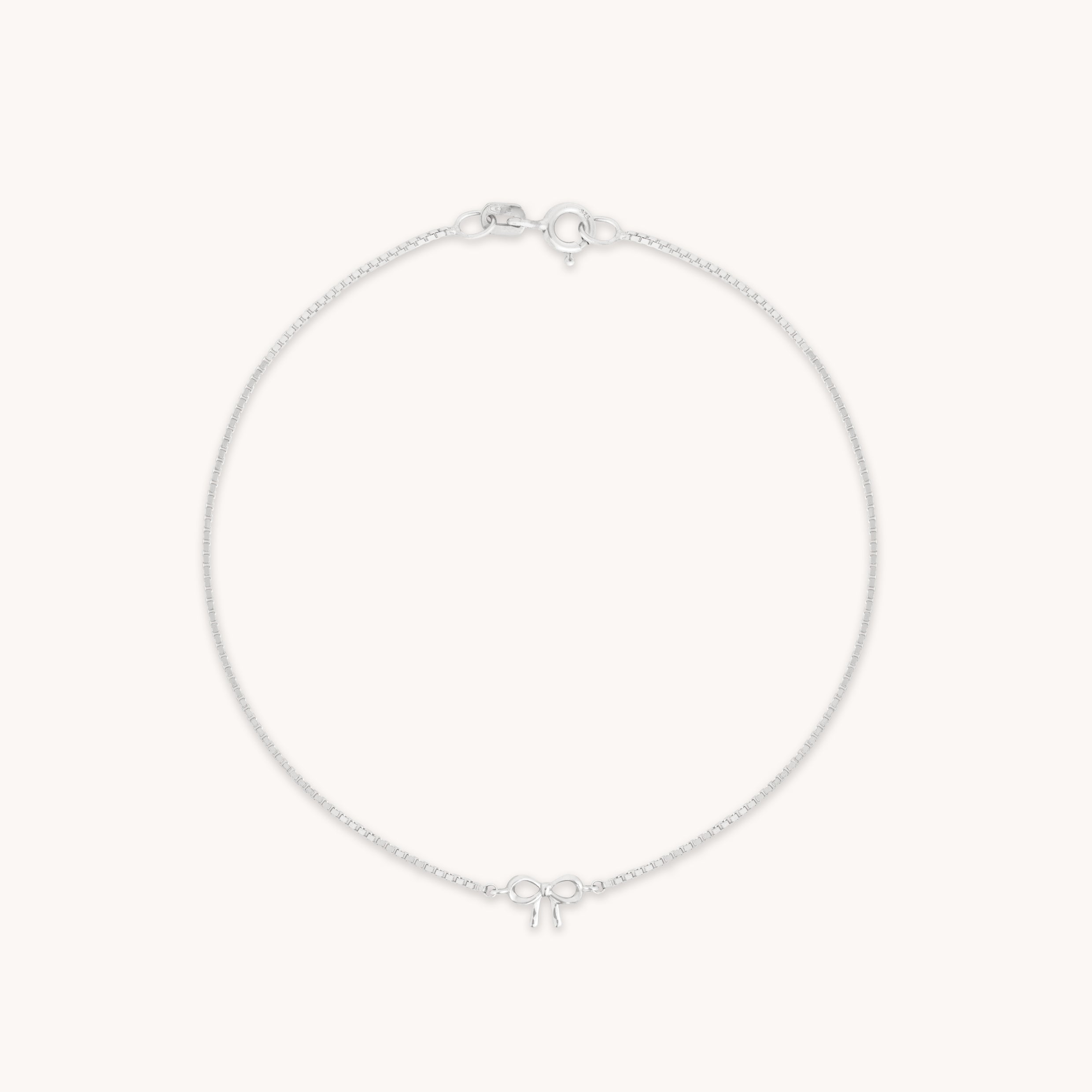 Bow Charm Bracelet in Solid White Gold