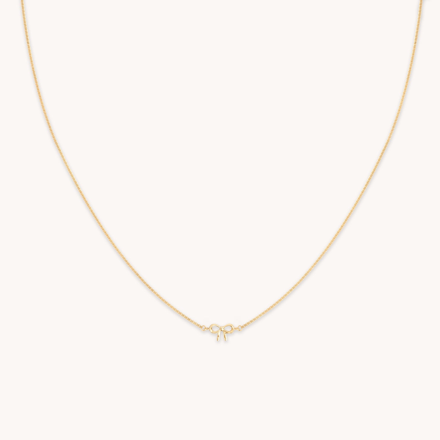 Bow Charm Necklace in Solid Gold