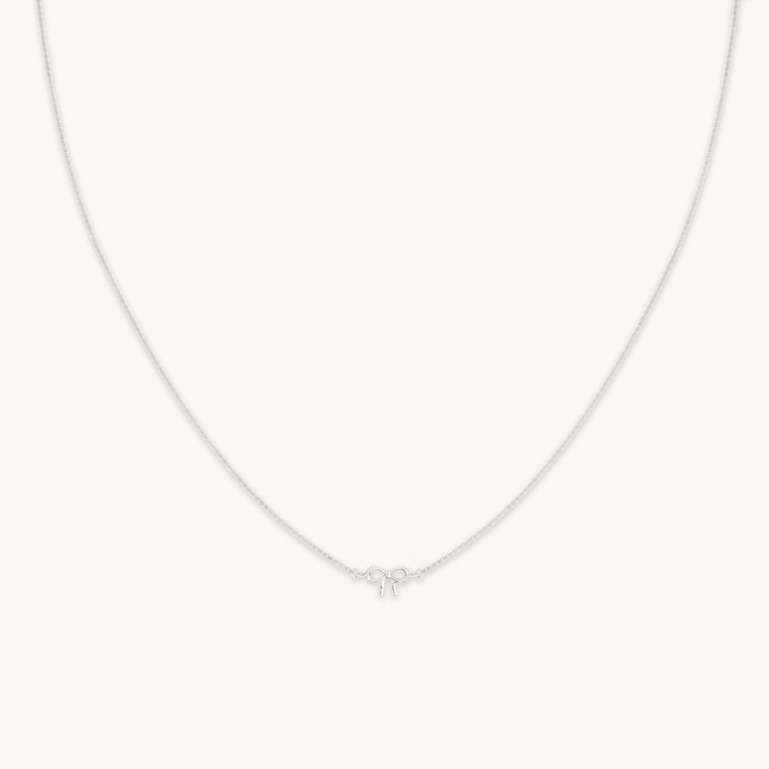 Bow Charm Necklace in Solid White Gold