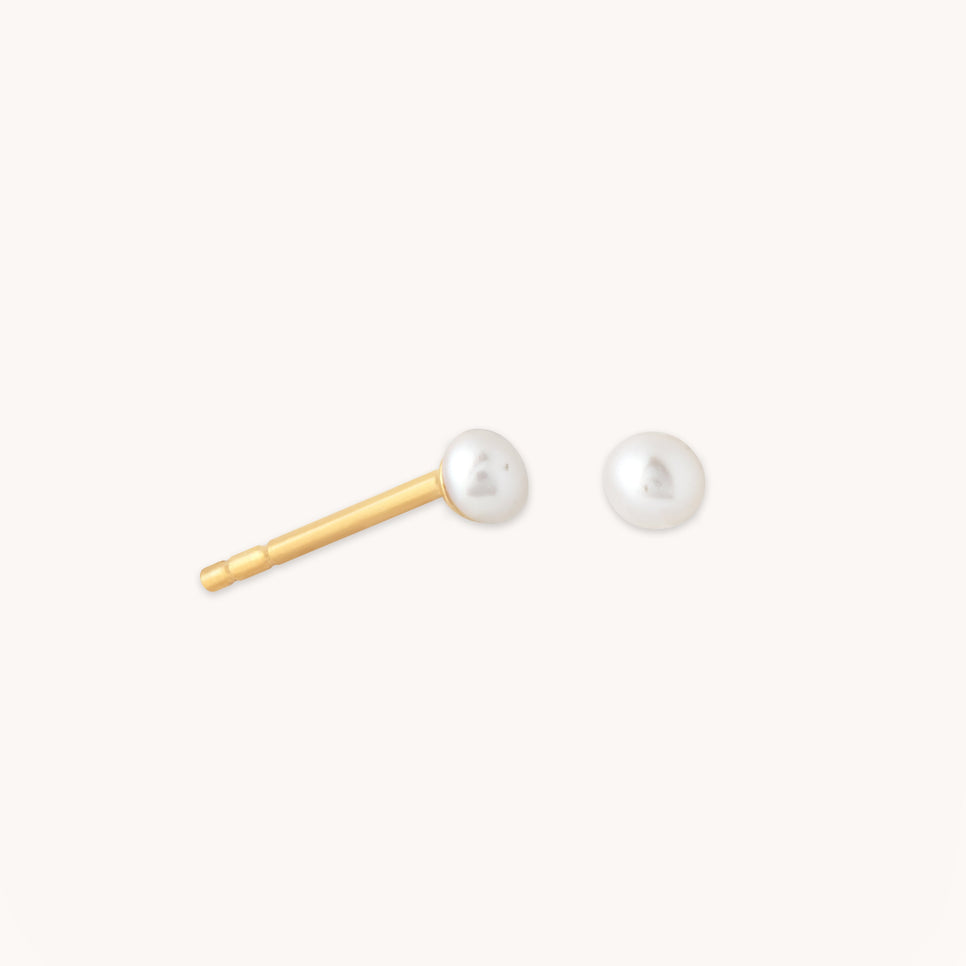 Radiant Pearl Stud Earrings in Gold