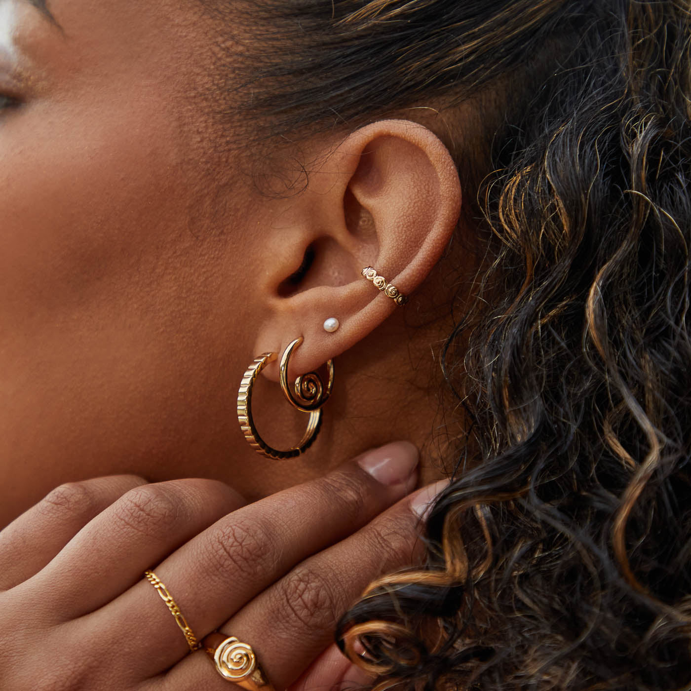 Shell Swirl Hoops in Gold