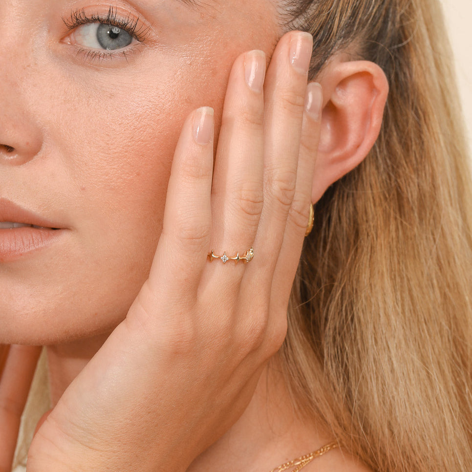 Cosmic Star Stacking Ring in Gold worn