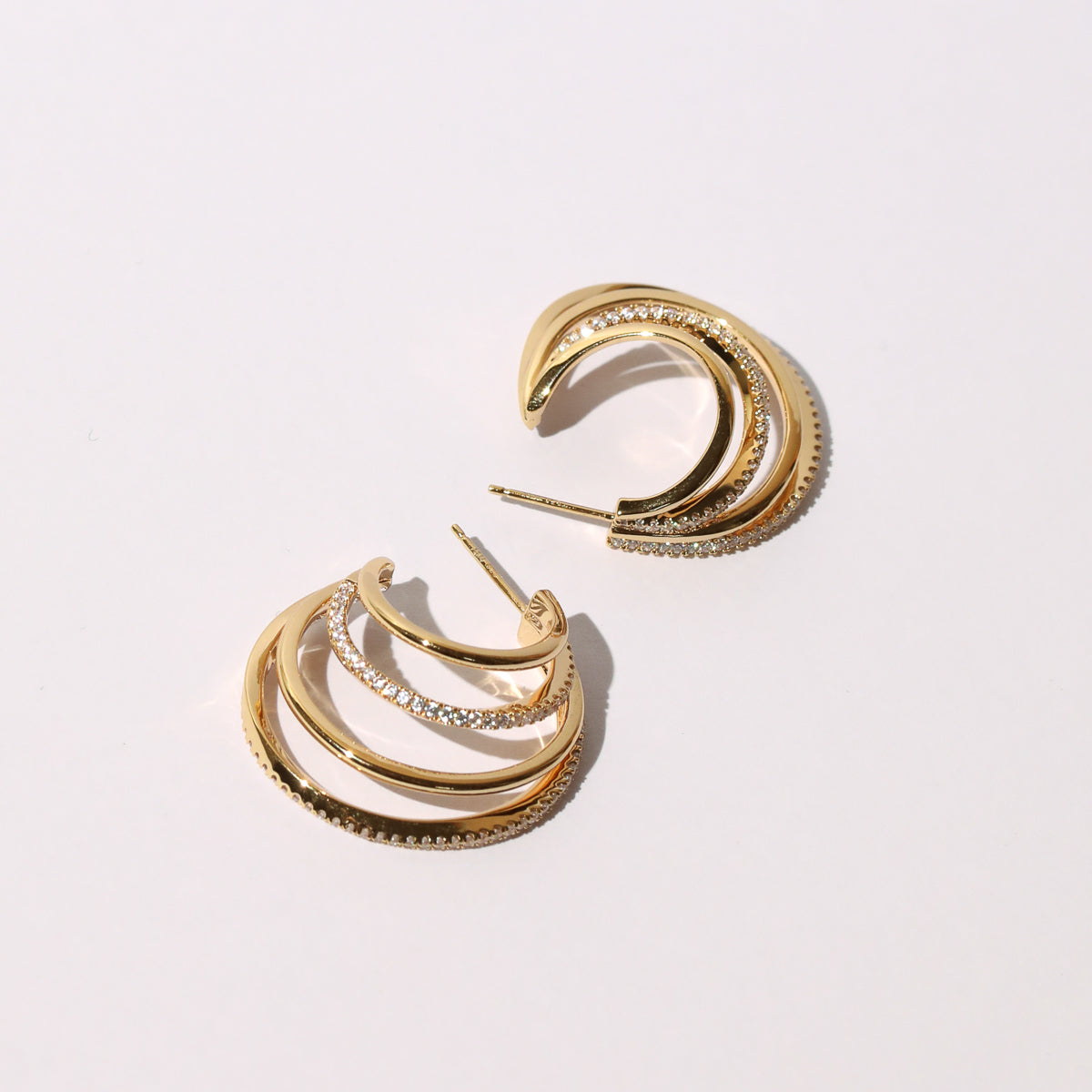 Orbit Crystal Hoops in Gold Flat lay