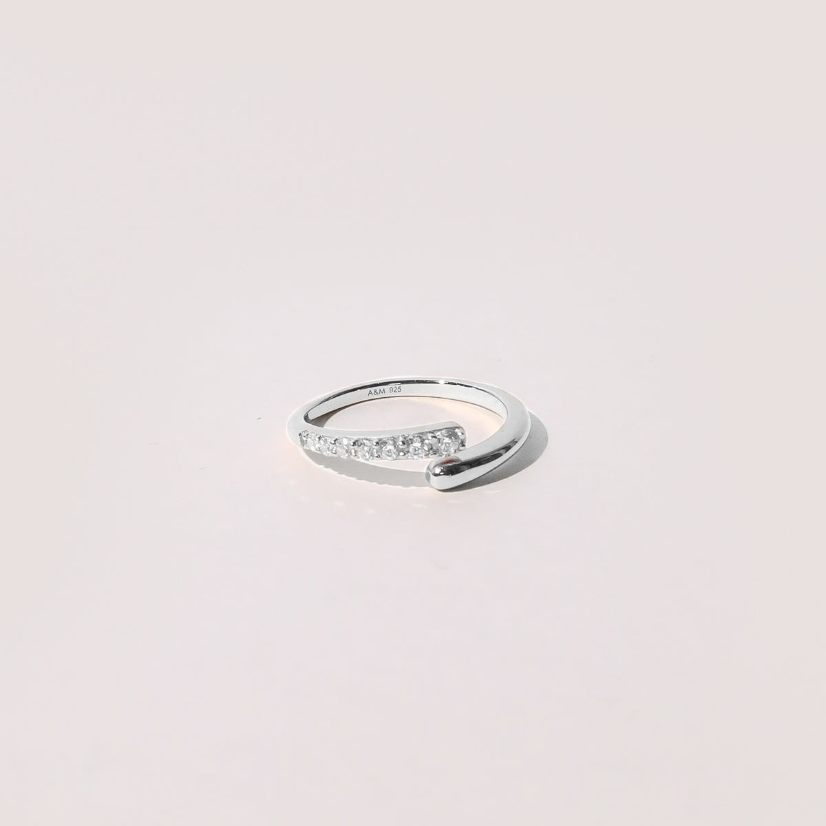 Orbit Crystal Ring in Silver flat lay