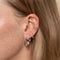 Pleated Hoops in Silver worn with other earrings