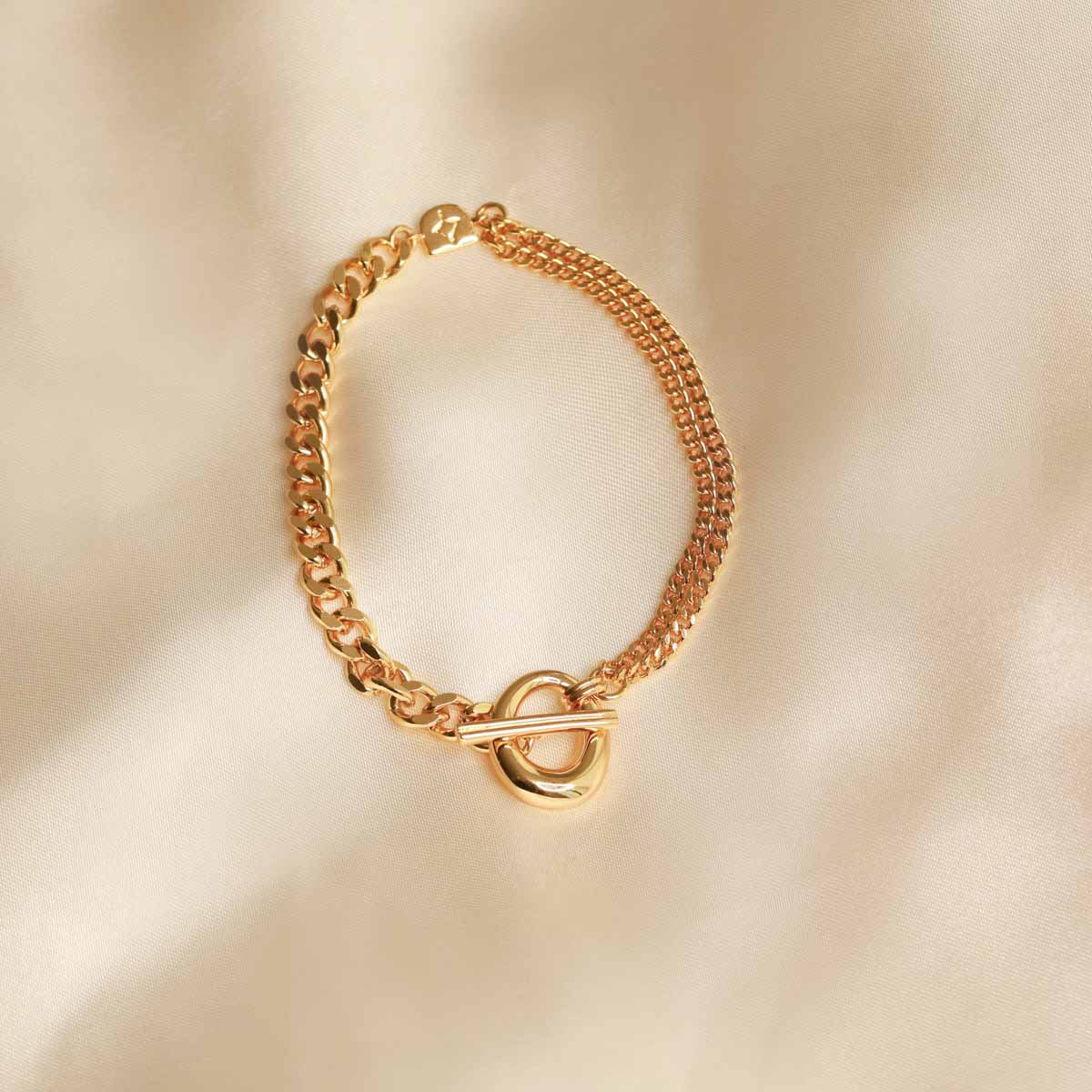 Flat lay image of Duo T-Bar Bracelet in Gold