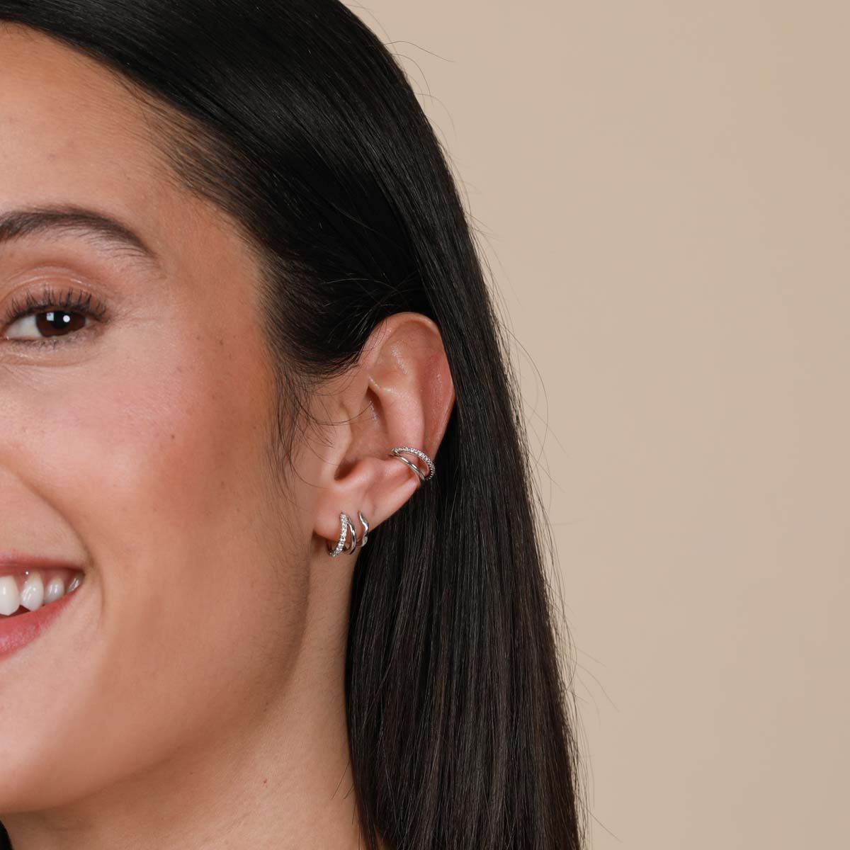 Worn shot of Illusion Pink Ear Cuff in Silver