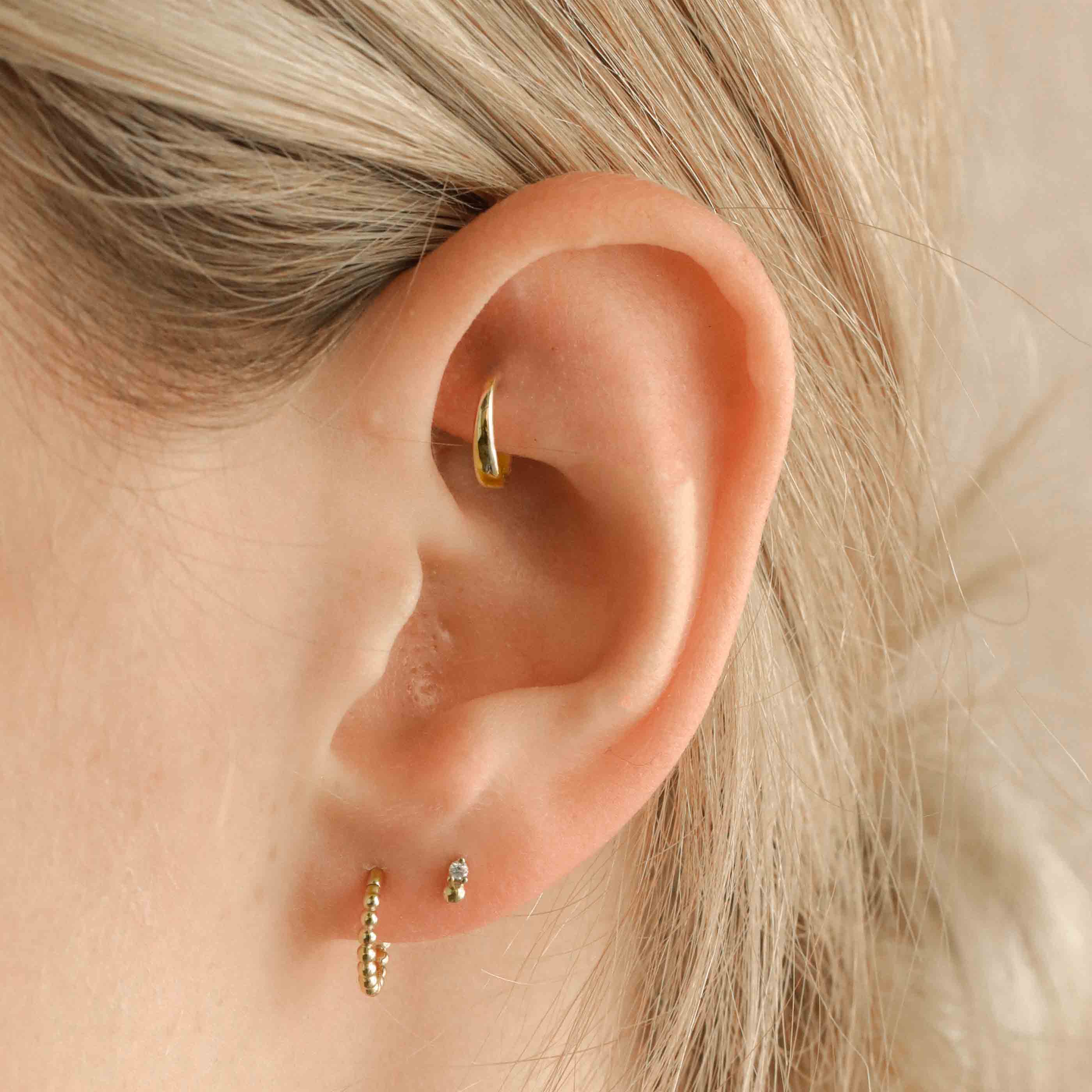 Rook piercing 2025 rose gold