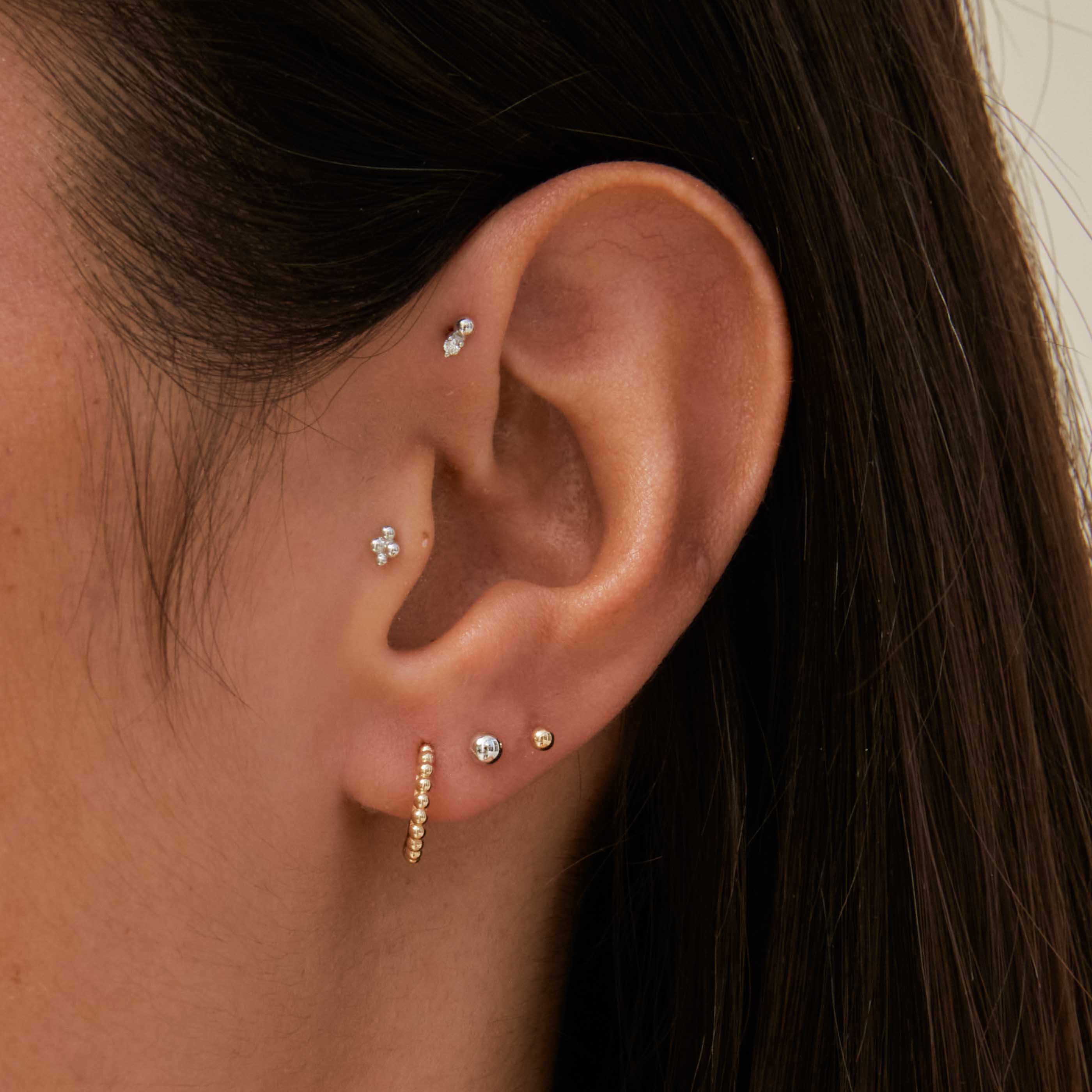 Gold on sale stud piercing