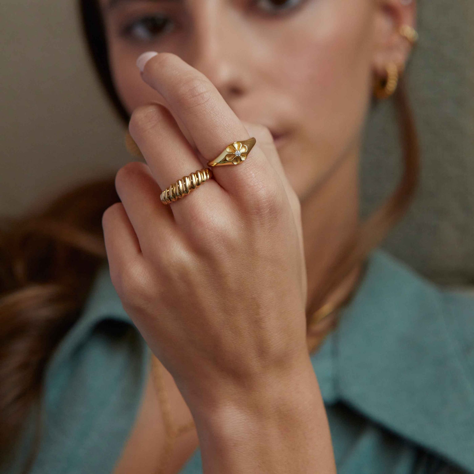 Rope Dome Ring in Gold worn with flora signet ring